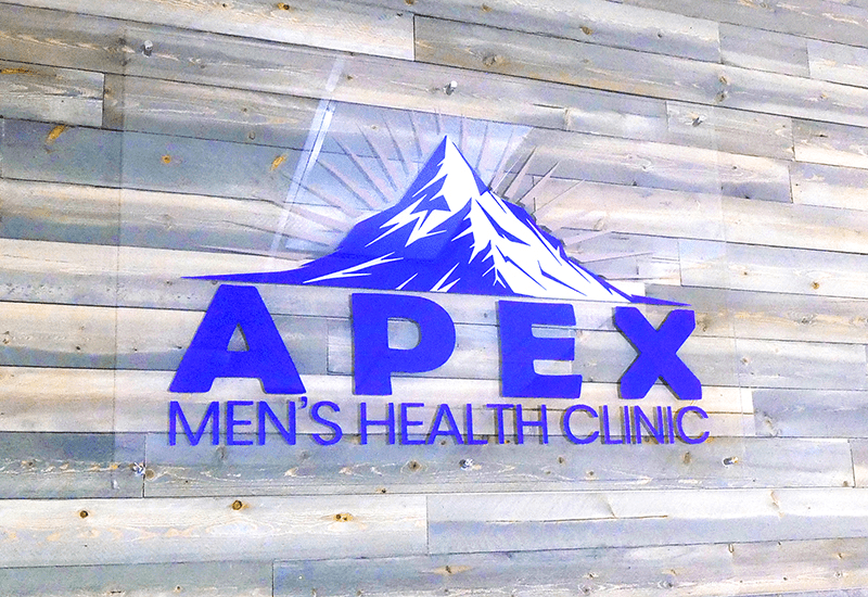 Apex Men's Health Clinic logo on wall of office, Omaha, NE